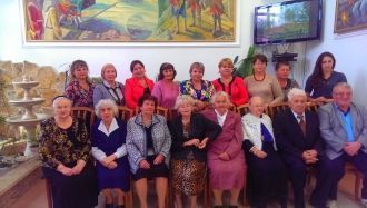 Работники музея современной истории Кизл