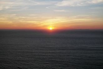 Закат солнца над океаном с мыса Финистер
